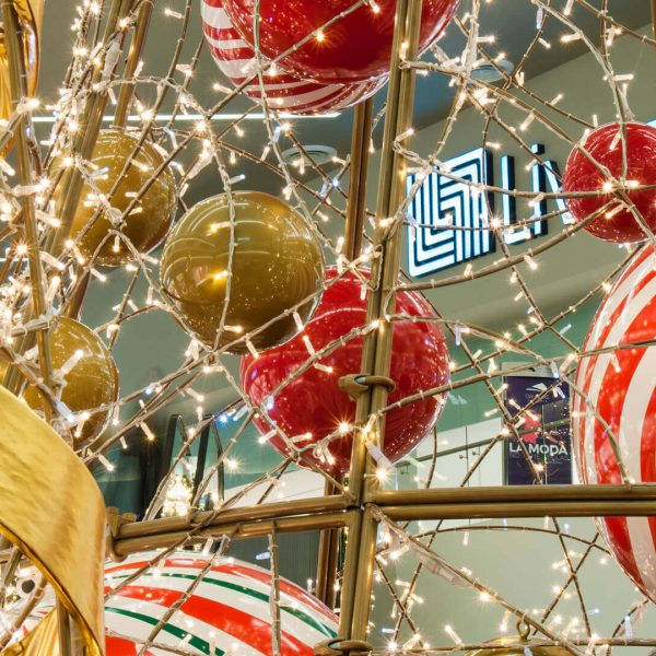 Close up of a light tree filled with balls representing candy in the shopping center Galerías Tlaxcala in the city of Tlaxcala, Mexico.
