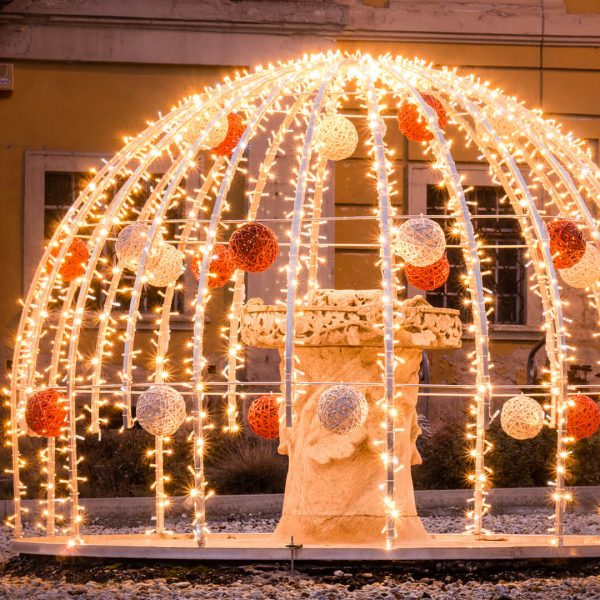 Light decoration with string lite and red and white organic balls in the city of Fertőrákos, Hungary.
