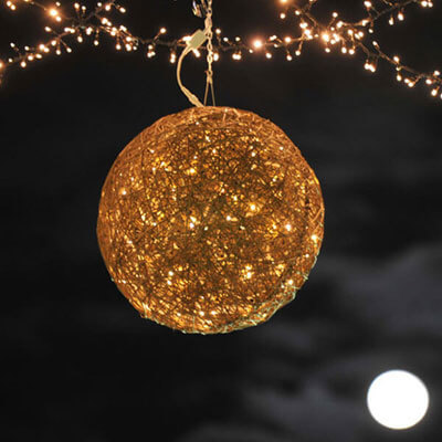 Illuminated golden organic ball.