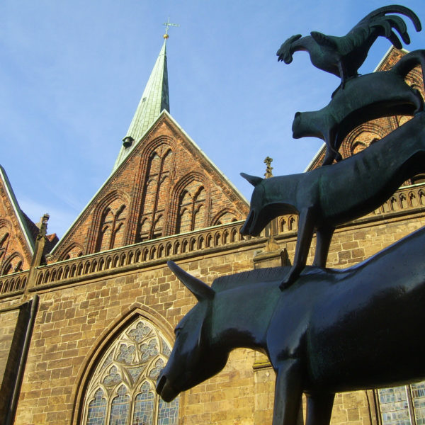 Sculpture of the animals from the Brothers Grimm´s fairytale "The Town Musicians of Bremen" in front of the townhall in the city of Bremen, Germany.