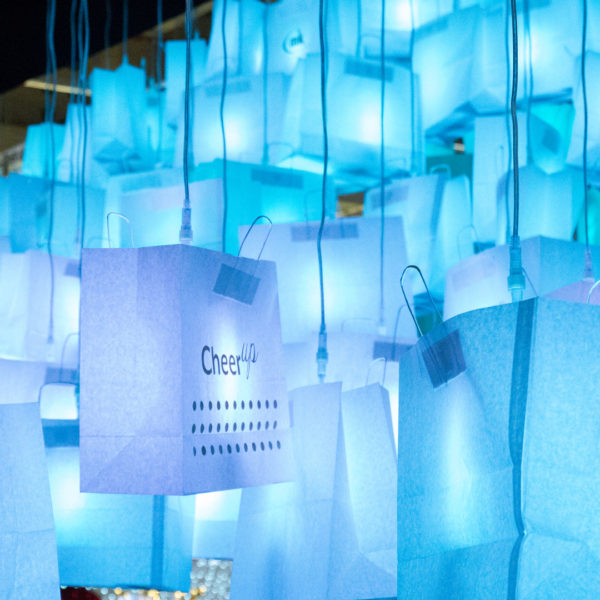 Illuminated shopping bags above the "Candle tree" at Christmasworld 2018 trade fair in the city of Frankfurt, Germany.
